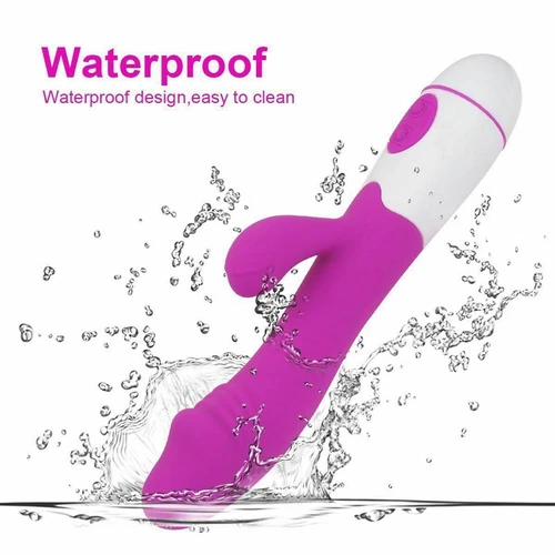 Purple and pink vibrating G Spot dildo with textured surface, shown in detailed black and white illustration with water splash.